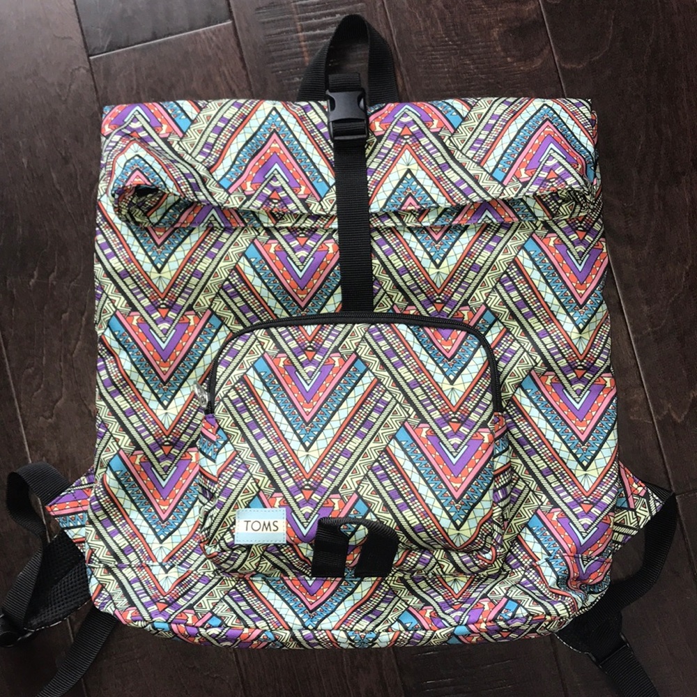 Brand new TOMS backpack in multi color